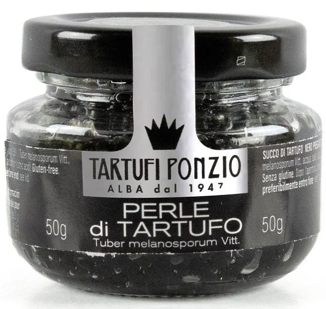 Un petit pot de Tartufi Ponzio avec de succulentes perles de jus de truffes qui viennent éclater sous la dent pour libérer une explosion de saveur